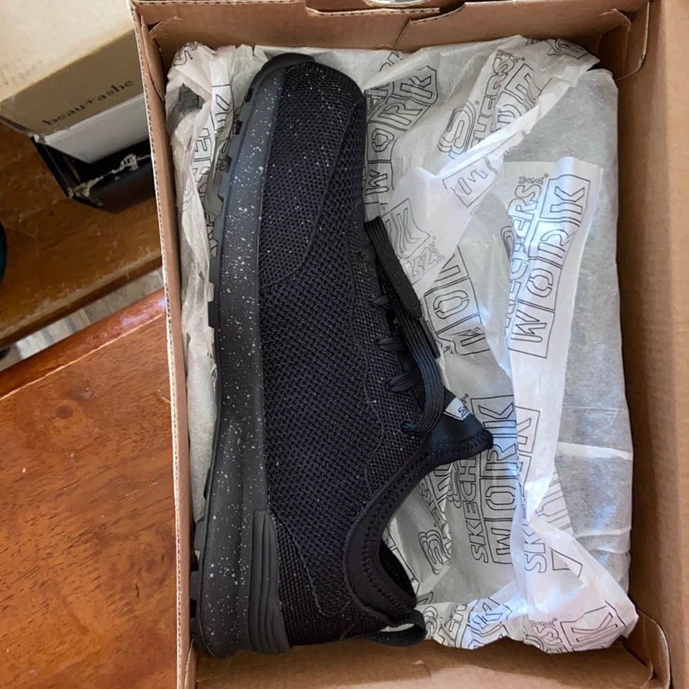 Black with light sparkles.